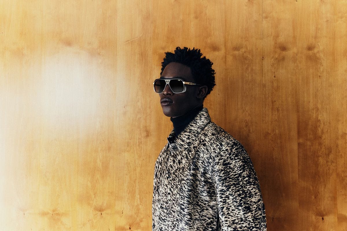 A man in a leopard-print jacket wearing Cazal MOD 685 sunglasses