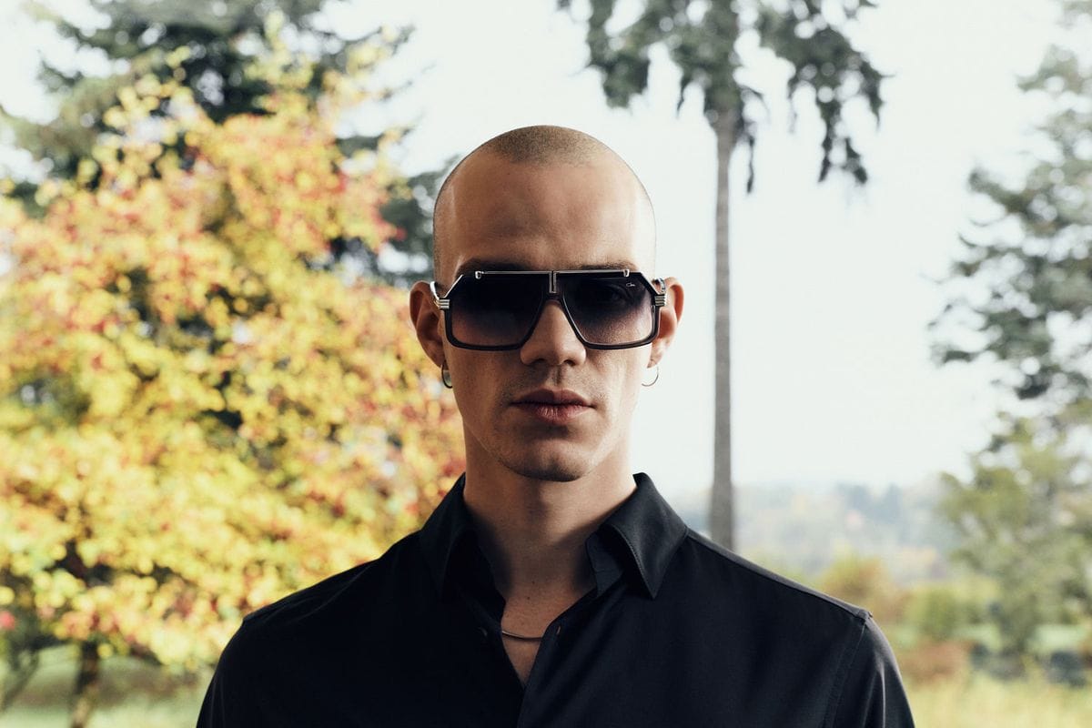 A man wearing Cazal MOD 687 sunglasses outdoors