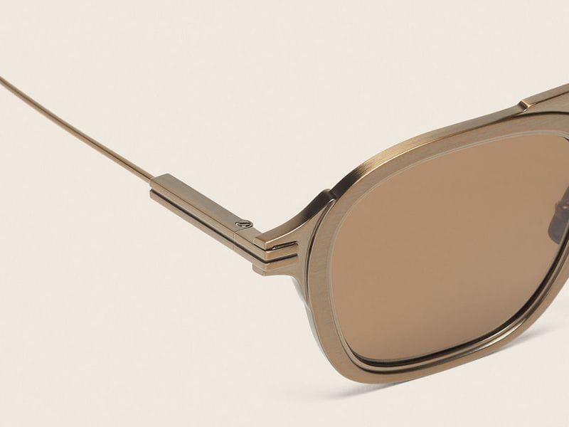 Zegna Orizzonte I Titanium sunglasses in Antique Gold, close-up of the temple